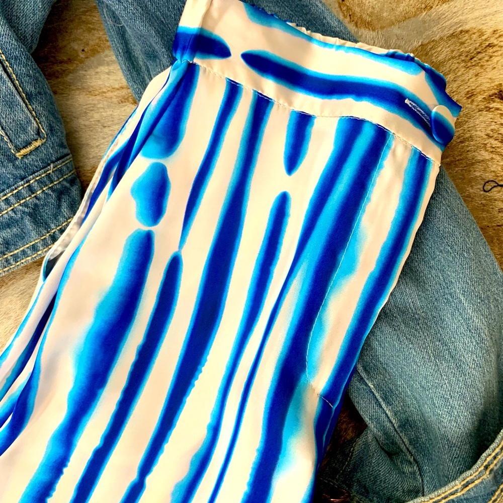 Jeans jacket $45 pants $80 tank top $60 made in Italy